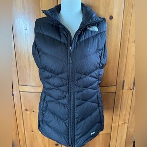 The North Face black full zip women’s down vest, size S. Excellent condition.